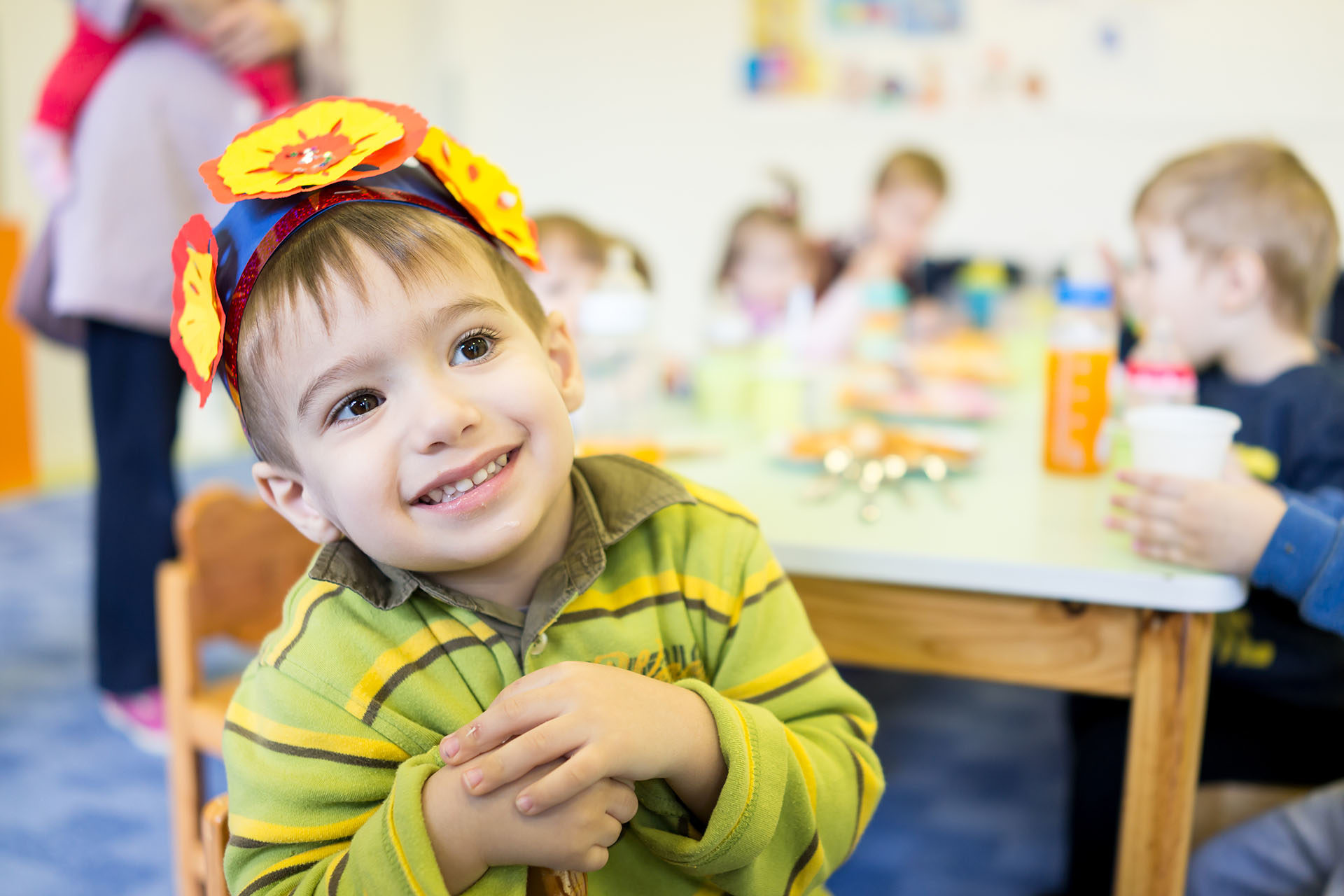 boy in hat smiling