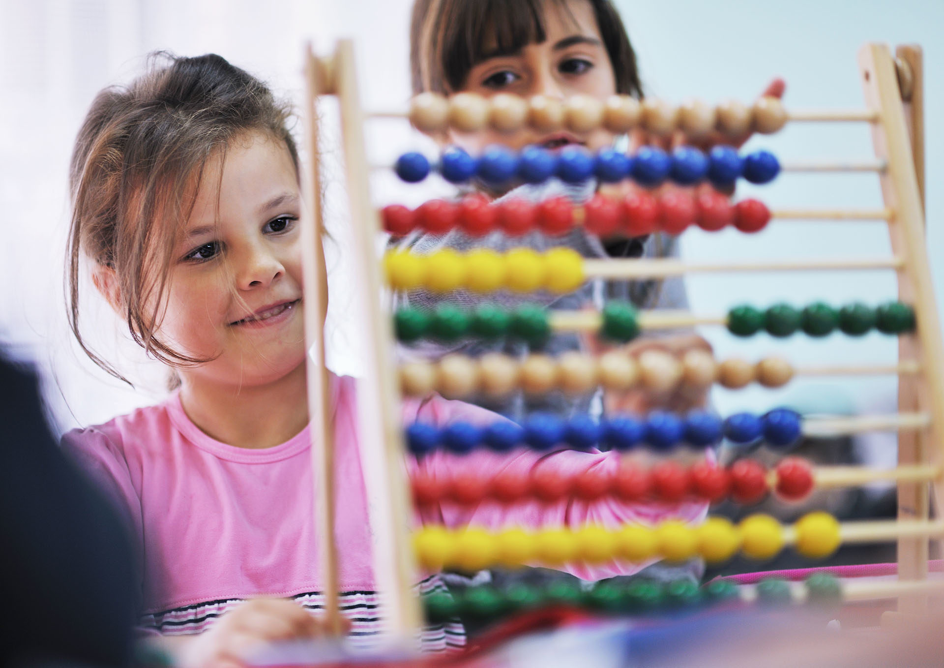 girls using abacus