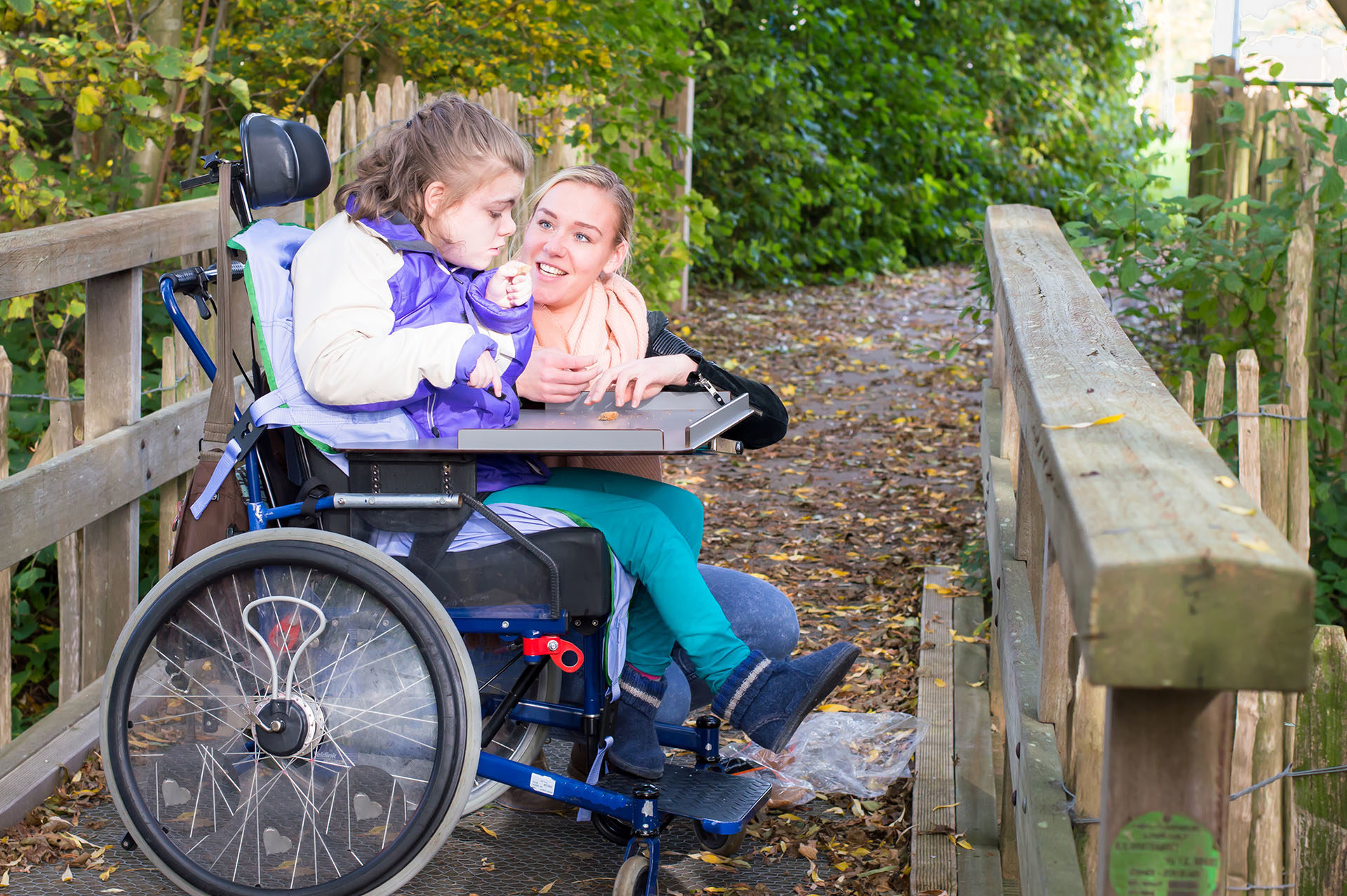 woman and girl outdoors in woodlands