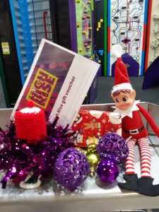 Elf on the shelf with Christmas gift voucher for High Rise Lisburn