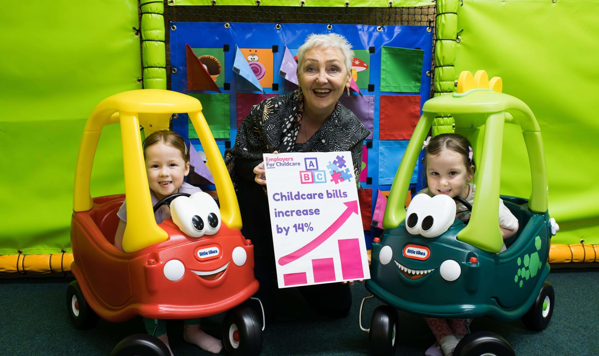 Isabelle and Heidi Gallagher help Marie Marin, Chief Executive, Employers For Childcare, launch the 2023 Northern Ireland Childcare Survey in High Rise Lisburn